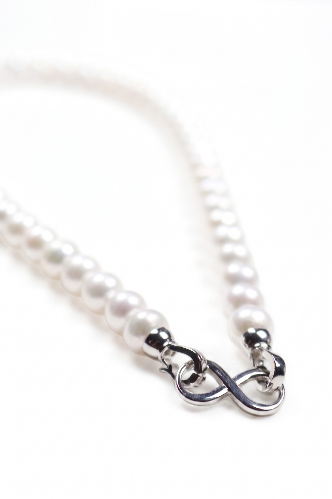 Elegant White Pearl Necklace with Infinity Clasp — image 2