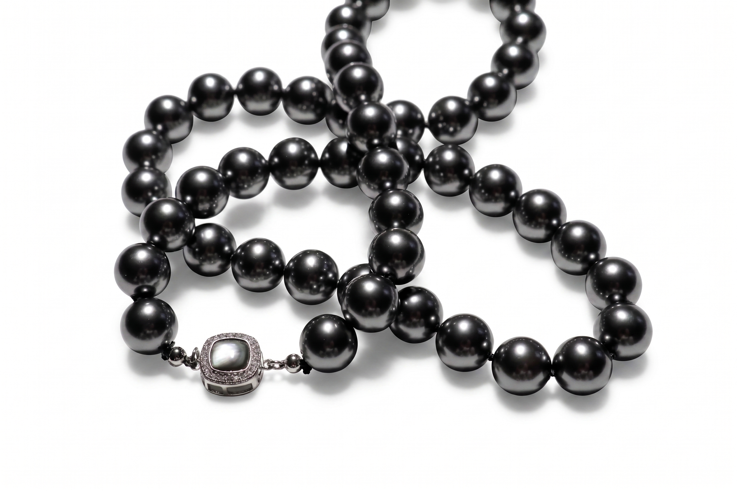 Elegant Black Pearl Necklace with Diamond Clasp — image 1